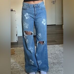 Hollister hawaiian flower baggy jeans with ripped holes